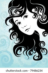 Beautiful girl with curly hair on a blue background