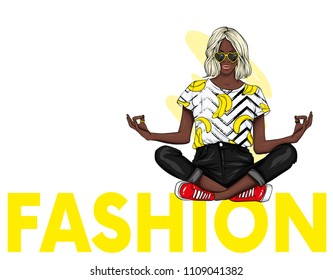 A beautiful girl in jeans and a top is sitting in a stylish inscription in a yoga pose. Vector illustration. Clothes and accessories. Print on clothes. Fashion & Style. Fashionable look. Black woman.
