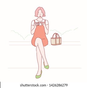 Beautiful girl photographer with old camera. Hand drawn style vector design illustrations.