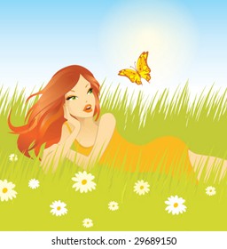 beautiful girl relaxing in the grass