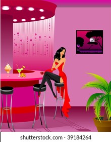 The beautiful girl sits at a bar rack at restaurant