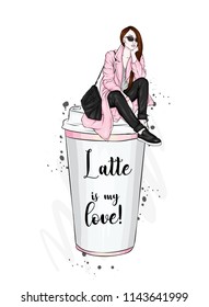 Beautiful girl is sitting on a glass of coffee. Vector illustration for a postcard or a poster. Hand drawing. Coffee to go. Fashion & Style.