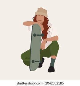 Beautiful girl in stylish clothes and a skateboard. Skater.