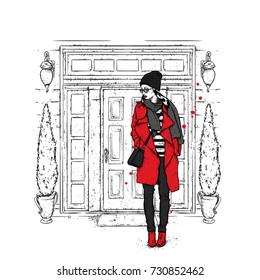 Beautiful girl in a stylish coat on the background of a beautiful vintage door. Street and house. Vector illustration for a postcard, cover, poster, or print on clothes.