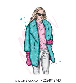 A beautiful girl in a stylish fur coat and glasses. Fashion and style, clothing and accessories.