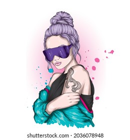 Beautiful girl in a stylish glasses. Fashion, style, clothing and accessories.