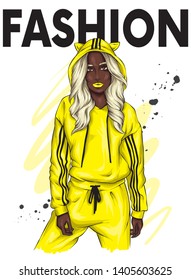 Beautiful girl in a stylish tracksuit. Fashion clothes and accessories, fashion and style. Illustration. Bright drawing.