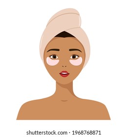 A beautiful girl with a towel on her head and patches. Care for yourself and your face. Beauty treatments. Spa care