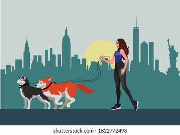 beautiful girl walks with black and red huskies on the background of New York City