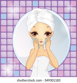 Beautiful girl washes his face in the bathroom