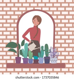 Beautiful girl waters flowers with watering can. Young woman taking care of her garden. Caring for indoor plants. Stay home lifestyle. moments of happiness.