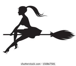 Beautiful glamour witch flying on a broomstick