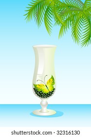 Beautiful glass for a cocktail with the butterfly