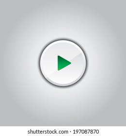 Beautiful glossy play button on a gray background