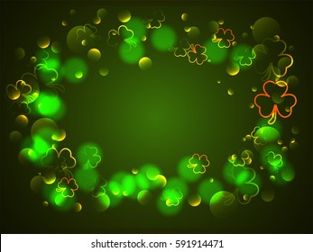 Beautiful glowing frame with shamrock leaves decoration. Creative green background for Happy St. Patrick's Day celebration.