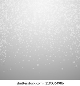 Beautiful glowing snow Christmas background. Subtle flying snow flakes and stars on light grey background. Bizarre winter silver snowflake overlay template. Authentic vector illustration.