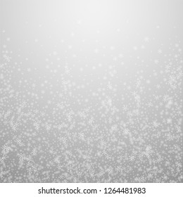 Beautiful glowing snow Christmas background. Subtle flying snow flakes and stars on light grey background. Admirable winter silver snowflake overlay template. Wonderful vector illustration.