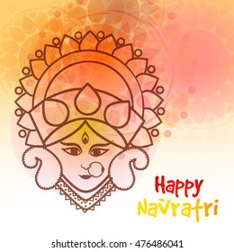 Beautiful goddess maa durga face for festival of navratri celebration background.