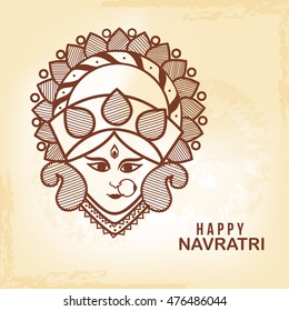 Beautiful goddess maa durga face for festival of navratri celebration background.