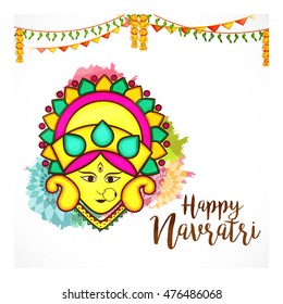 Beautiful goddess maa durga face for festival of navratri celebration background.