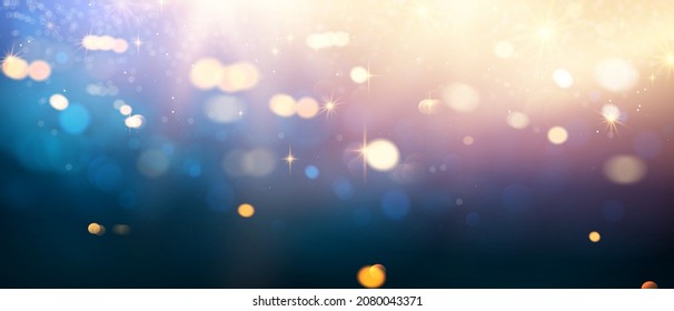 Beautiful gold and blue glitter stars on black blue abstract background are used for celebrations.