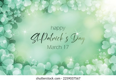 Beautiful green background with clover leaf bokeh. St.Patrick 's Day. Greeting card.