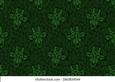 Beautiful green seamless pattern with tribal stylized giraffe head and leaves shapes on the dark background