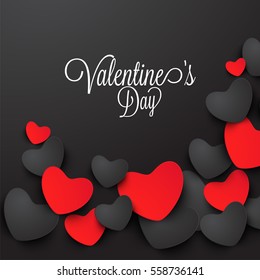 Beautiful greeting card decorated with glossy red and balck hearts for Valentine's Day Celebration.