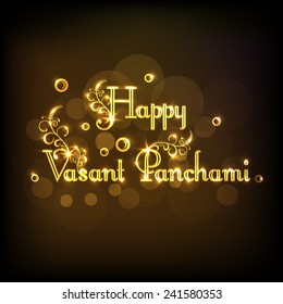 Beautiful greeting card design with floral decorated shiny text Happy Vasant Panchami on brown background.