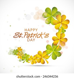 Beautiful greeting card design with green and golden shamrock leaves for Happy St. Patrick's Day celebration.