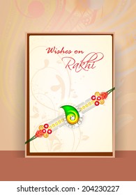 Beautiful greeting card design with rakhi for Happy Raksha Bandhan celebrations. 