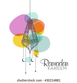 A beautiful greeting card of ramadan kareem with decorated hanging lamp.