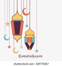 A beautiful greeting card of ramdan mubarak with colorful hanging lamp.