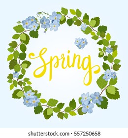 Beautiful greeting card with a wreath of spring blue flowers and lettering