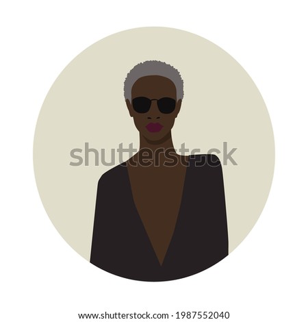 beautiful grey-haired black lady in  black circle sunglasses. portpait of african american strong woman. isolated on a grey background 
