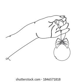 Beautiful hand with christmas toy. One line drawing. Vector illustration continuous line drawing.