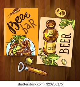 Beautiful hand drawn cards beer and snacks. Food top view.