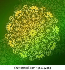 Beautiful hand drawn mandala with floral ornament on warm green background