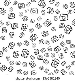 Beautiful hand drawn seamless pattern  fashion camera icon. Hand drawn black sketch. Sign / symbol / doodle. Isolated on white background. Flat design. Vector illustration.
