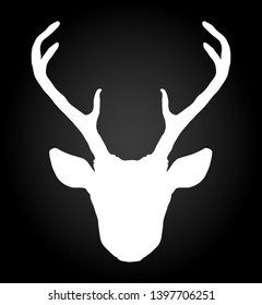 Beautiful hand drawn tribal style deer head silhouette. Magic vintage vector illustration in black and white. Spiritual art, yoga, boho style, nature and wilderness.