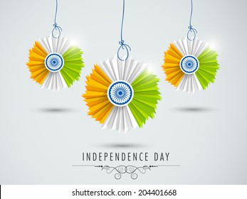 Beautiful hanging decorative in Indian National Flag colors on grey background for 15th of August, Independence Day celebrations. 