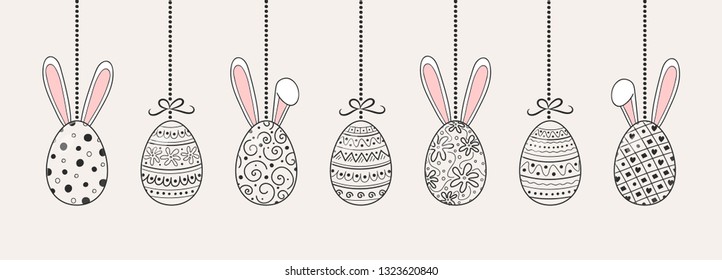 Beautiful hanging Easter eggs with bunnies. Vector