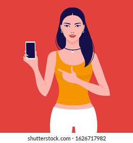 Beautiful happy Asian woman holding a mobile phone and pointing on it, vector flat illustration. Cute Asian smiling girl showing a smartphone.