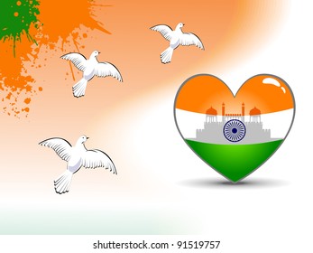 Beautiful heart shape flag with red fort reflection and flying pigeon on grunge background for Independence Day and Republic Day.