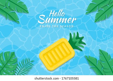 Beautiful Hello Summer background.  Summer background with tropical leaves and pineapple inflatable floating beds on the beach.