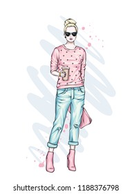 Beautiful high in pants, glasses and a sweatshirt. Stylish clothes and accessories. Fashionable woman. Vector illustration. Fashion & Style. Fashion look.
