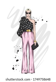 Beautiful high in pants and a shirt. Stylish clothes and accessories. Fashionable woman. Vector illustration. Fashion & Style. Fashion look. 