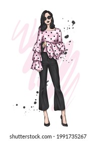 Beautiful high in pants and a shirt. Stylish clothes and accessories. Fashionable woman. Vector illustration. Fashion and Style. Fashion look. 