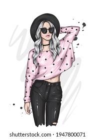 Beautiful hipster girl in a stylish hat, glasses, sweater and jeans. Fashion and style, clothing and accessories. Vector illustration for a postcard or poster.