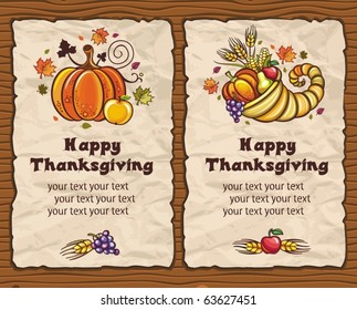 Beautiful Holiday paper arrangements with the space for your own text  on the wooden background. Horn of Plenty, pumpkin, apple, autumn leaves, grapes, apple, pear.